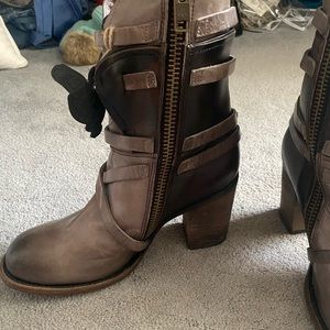 Hand crafted, hand made, leather zip up boots. Come up about half way the calf.